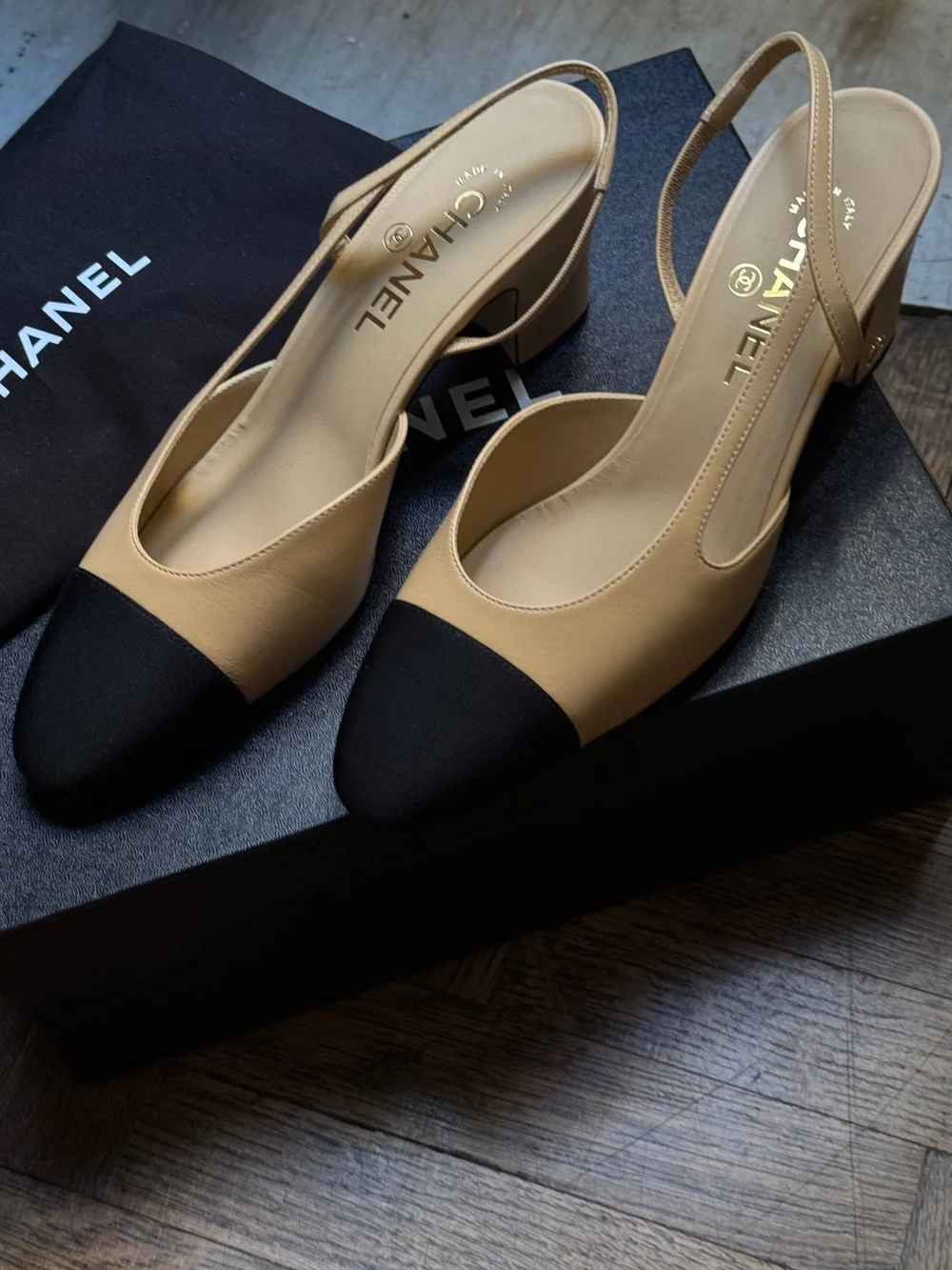 CHANEL Beige Slingback Pumps with Black Cap Toe